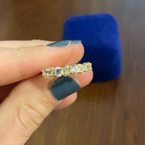 1.5 Carat Moissanite 14k Gold Band. 4 3/4 size. Brand new!